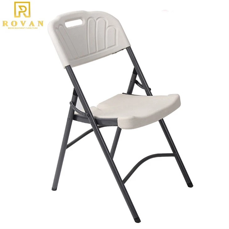 white plastic folding chair