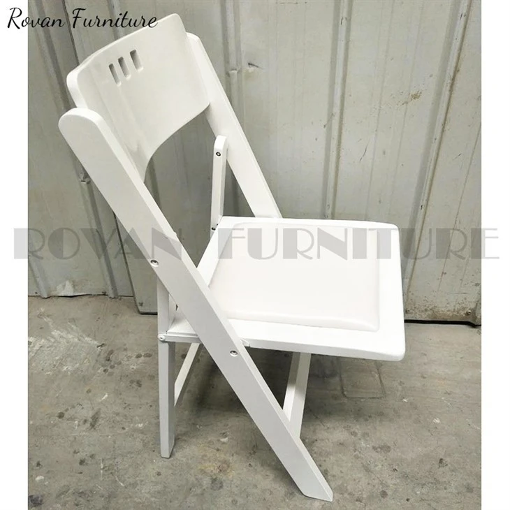 white foldable chairs